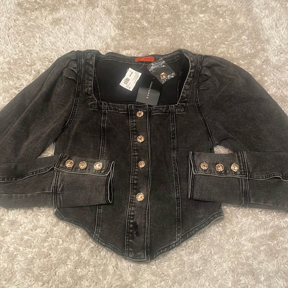 Brand new black jean long sleeve with gold buttoning in a medium